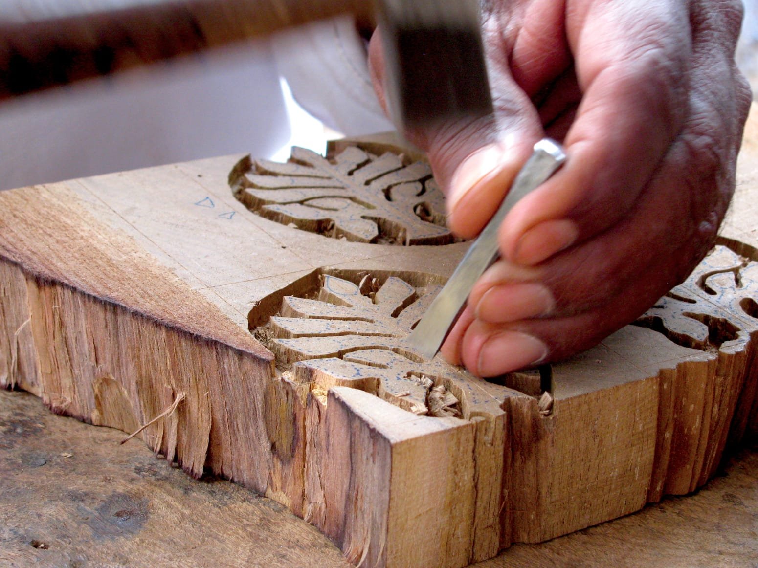 Master Artisan Creating Hand Carved Printing Blocks